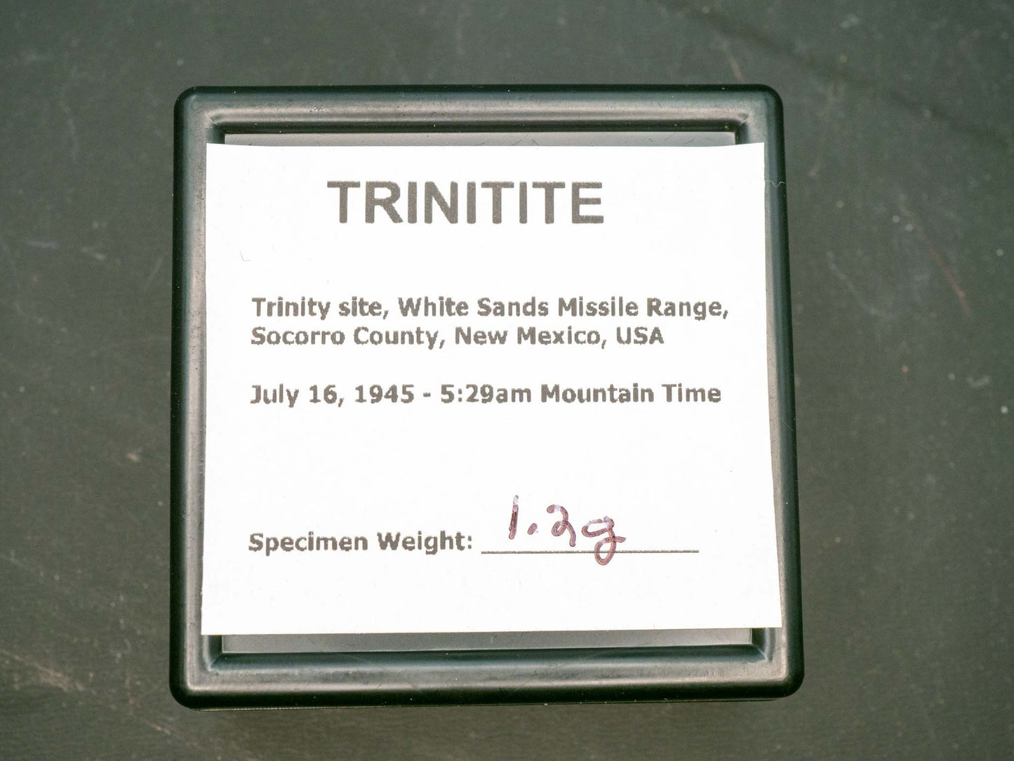 Trinitite (1.2 grams) - Trinity site, White Sands Missile Range, Socorro County, New Mexico, USA - July 16, 1945 at 5:29am MWT