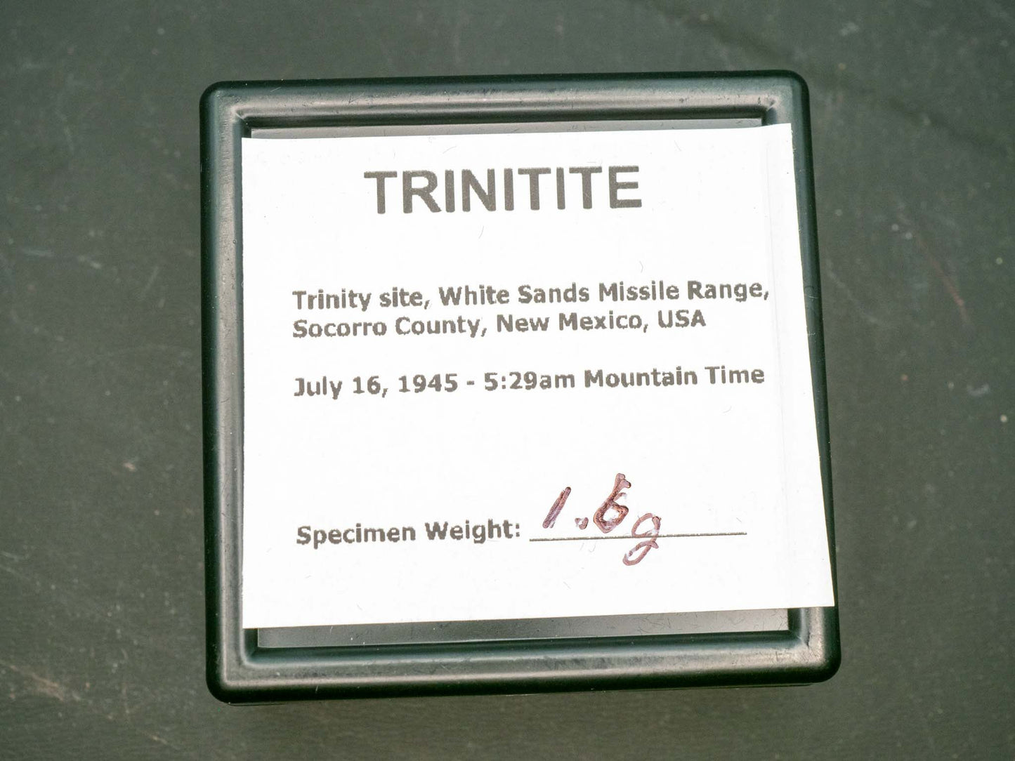 Trinitite (1.6 grams) - Trinity site, White Sands Missile Range, Socorro County, New Mexico, USA - July 16, 1945 at 5:29am MWT